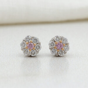 pink and white flower shaped diamond studs