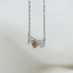 white and c4 champagne diamond pendant