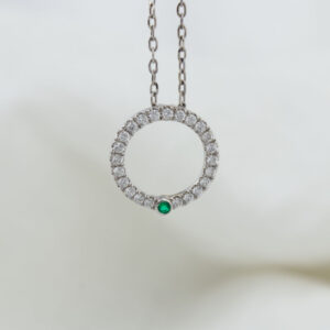 diamond and emerald white gold pendant