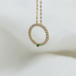 diamond and emerald yellow gold pendant