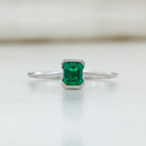 emerald bezel ring white gold