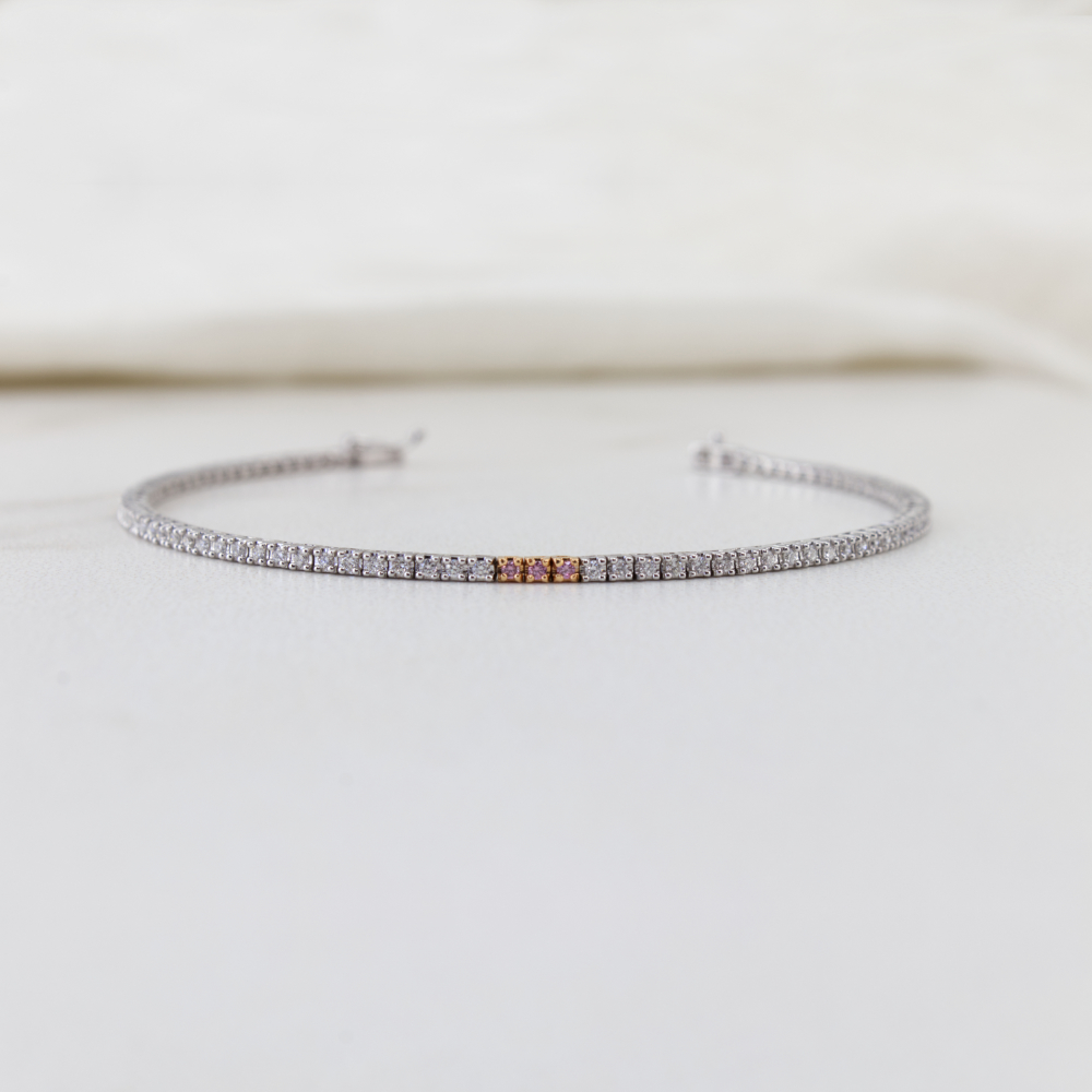 tennis bracelet with pink diamonds